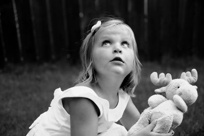 Portrait of cute girl looking away