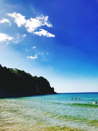 Scenic view of sea against blue sky