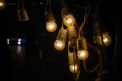 Close-up of illuminated light bulb