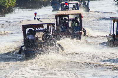 People enjoying in sea