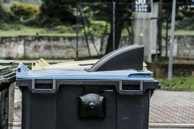 Close-up of garbage bin