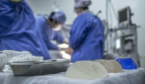 Rear view of people working