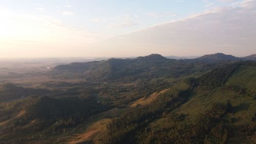 Scenic view of landscape against sky during sunset