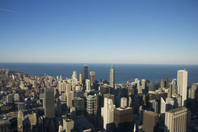 Cityscape with sea in background