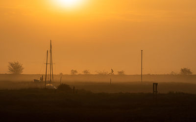 Scenic view of silhouette landscape against sky during sunset