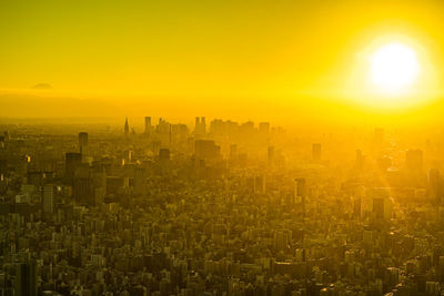 High angle view of townscape against sky during sunset