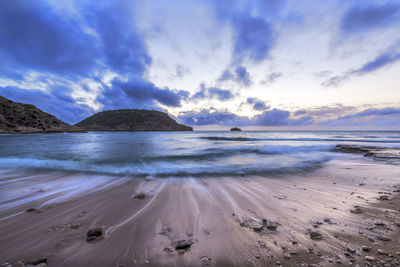 Scenic view of beach against sky