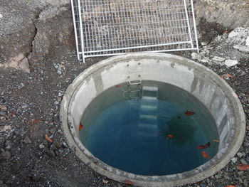 High angle view of water in manhole