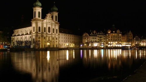 Exterior of illuminated church against sky at night