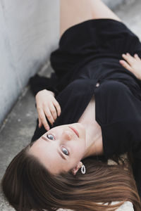 High angle portrait of woman lying down