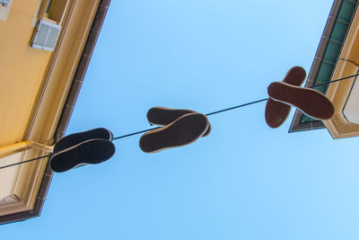 Low angle view of street light against clear sky