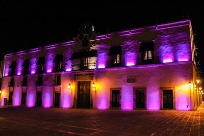 Illuminated building at night