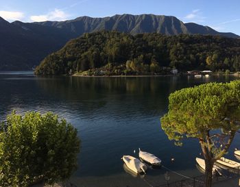 Scenic view of lake and mountains against sky