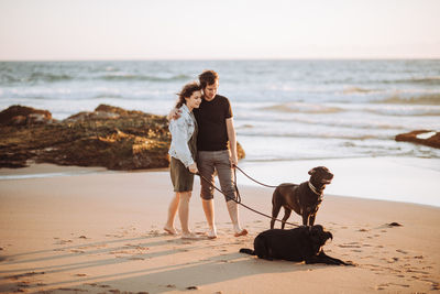 Man with dog on beach