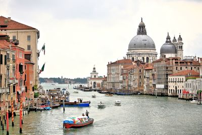 Santa maria della salute in grand canal against sky