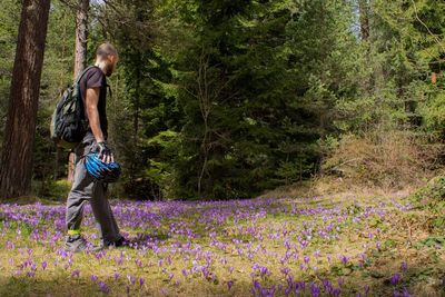 Full length of man standing on flower tree