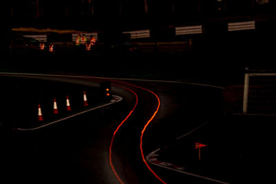 High angle view of light trails on road at night