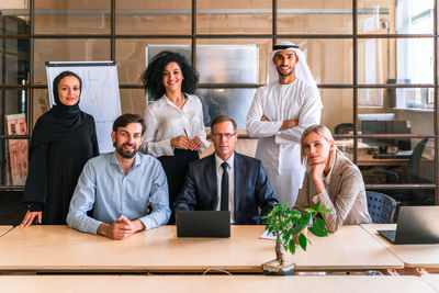 Business colleagues working in office