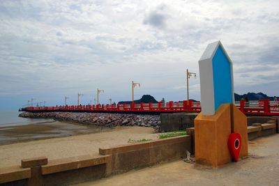 Pier over sea against sky