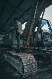 Man working at railroad station