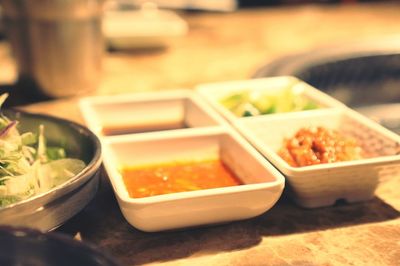 Close-up of food served on table