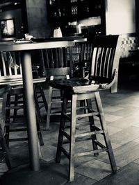 Empty chairs and tables in cafe