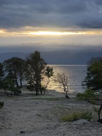 Scenic view of sea against sky during sunset