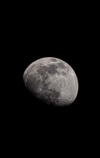 Low angle view of moon against sky at night