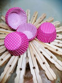 High angle view of strawberries in basket on table