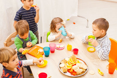 Students having meal at preschool