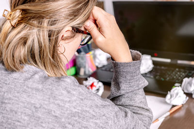 Close-up of woman using laptop
