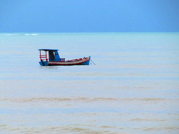 Boats in calm sea