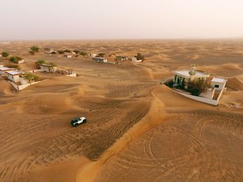 Aerial view of desert against sky