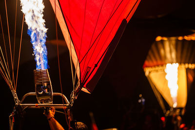 Low angle view of hot air balloon at night