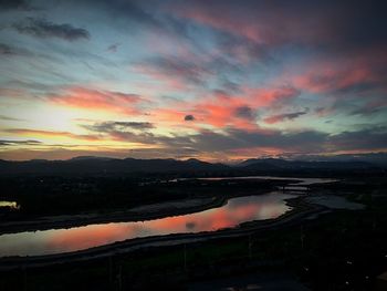 Scenic view of lake at sunset