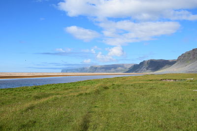 Scenic view of field against sky