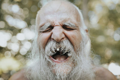 Close-up of man with eyes closed