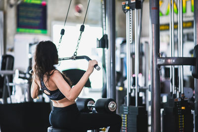 Woman exercising in gym