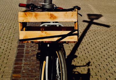 Close-up of bicycle against wall