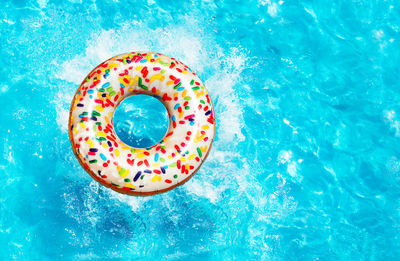 High angle view of inflatable ring in water