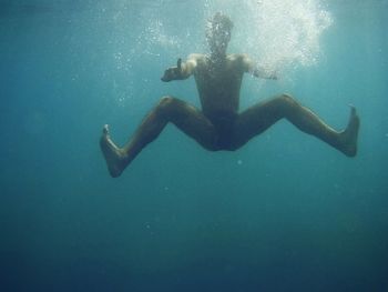 Man swimming in sea