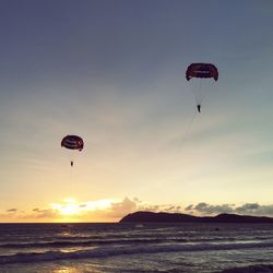 Scenic view of beach against sky during sunset