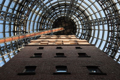 Low angle view of coops shot tower in city