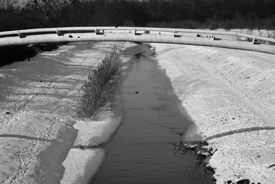 High angle view of bridge over river during winter