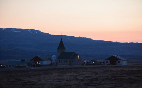 Scenic view of mountains against sky during sunset