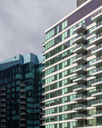 Low angle view of modern buildings in city against sky. boston 