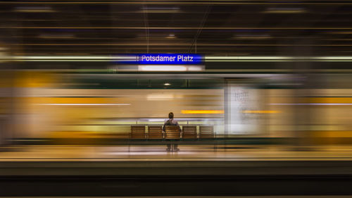 Blurred motion of train at railroad station