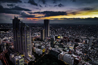 High angle view of city at sunset