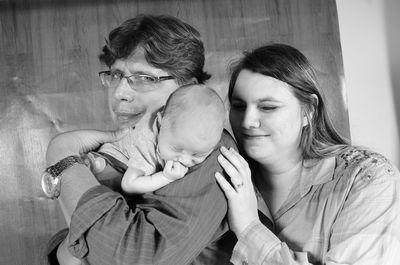 Close-up of mother holding baby girl