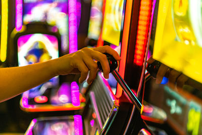 Cropped image of man holding guitar